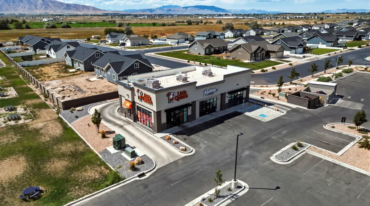 Aerial view of the Salem retail building and its parking area surrounded by residential streets