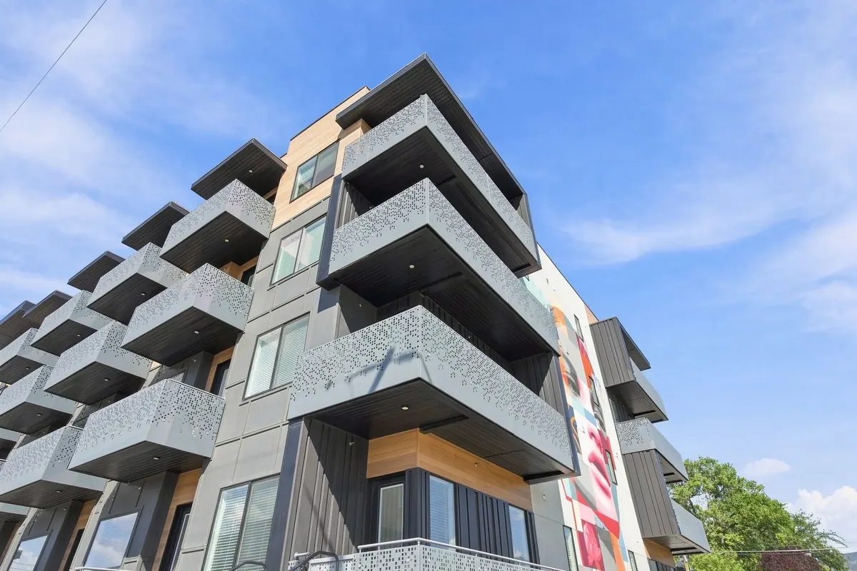 Gallacher Apartments corner facade with stacked balconies