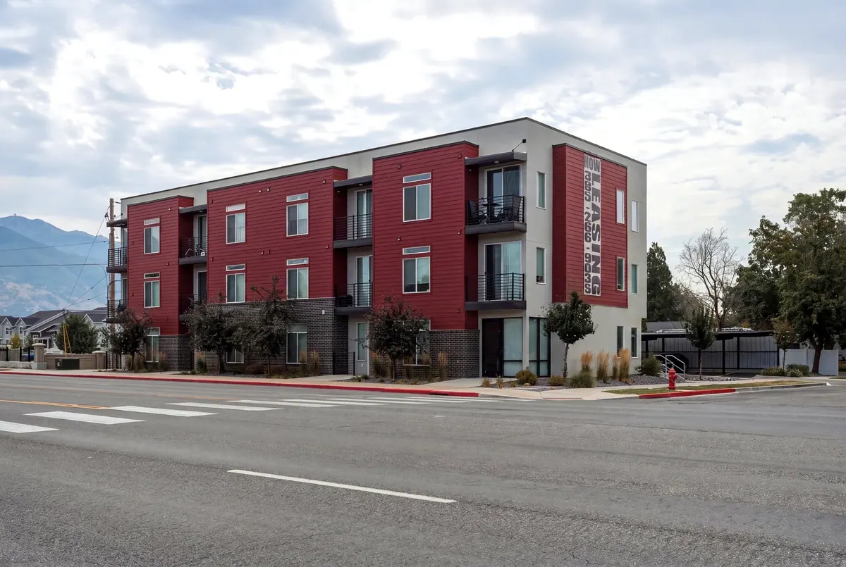 Studios On Gordon — street corner apartment building hero