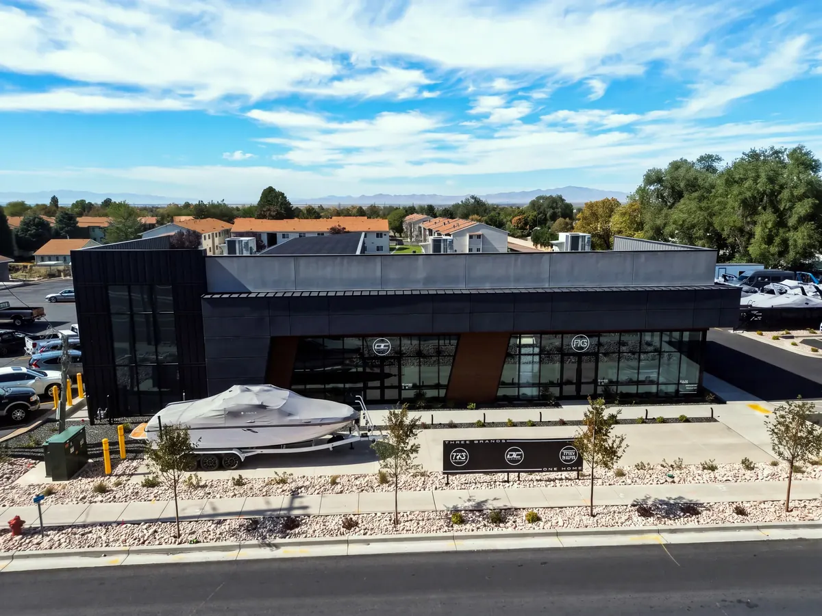 Street-facing exterior of the DC Customs and Boat Shack retail and service building in Woods Cross, Utah