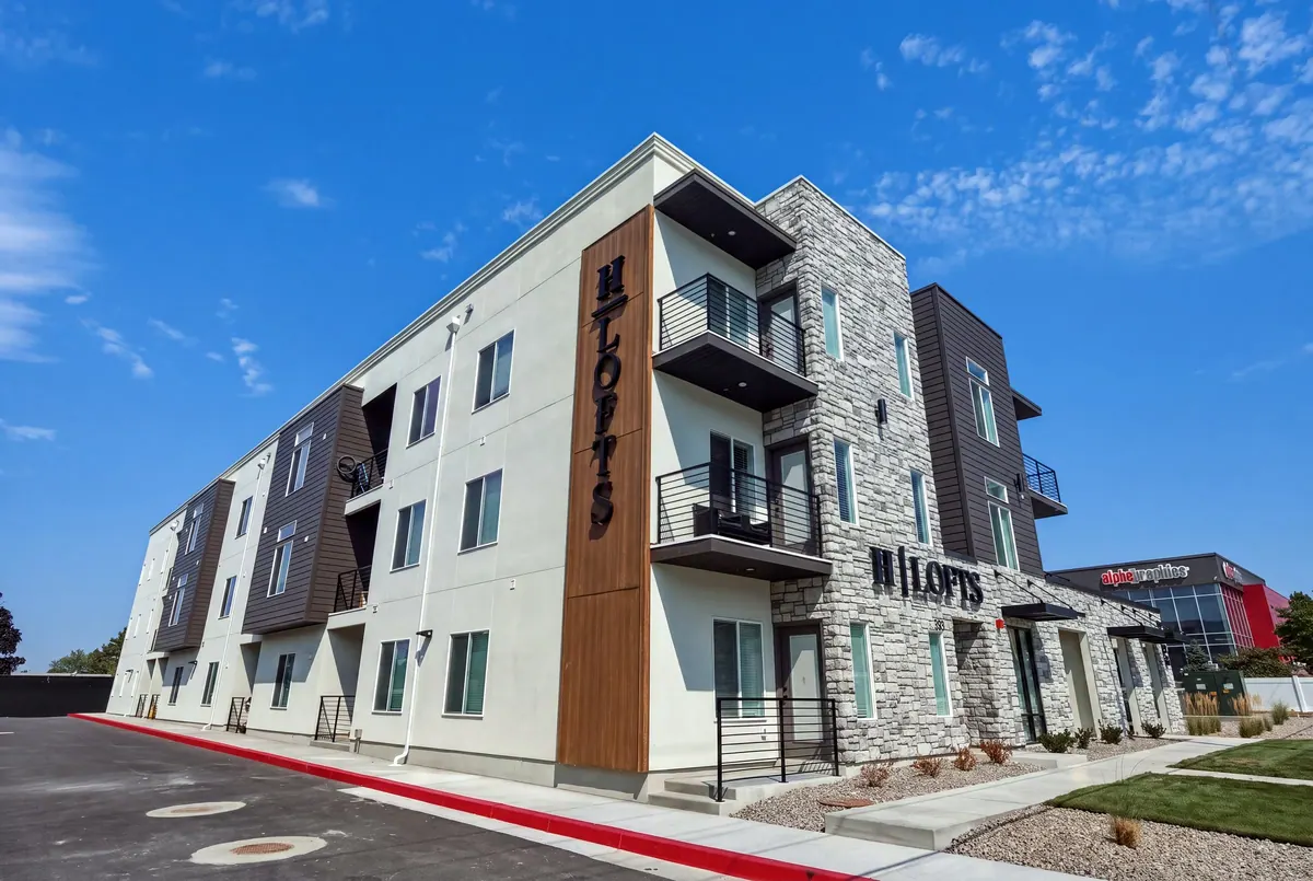 H Lofts — apartment building exterior hero