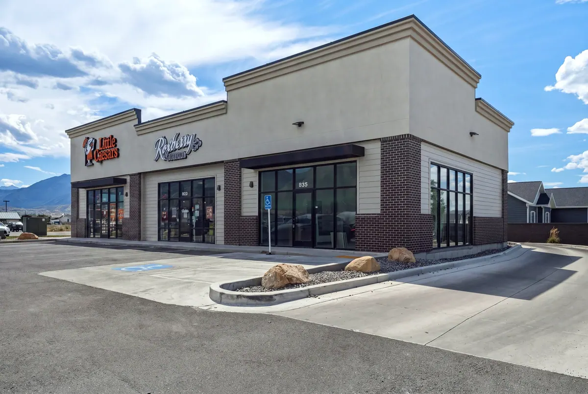 Street-level view of a three-tenant retail building in Salem, Utah