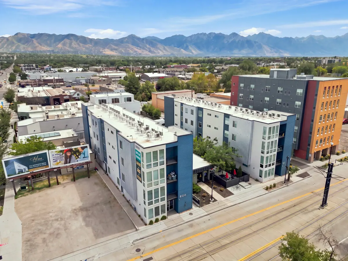 Aerial view of 9th Station apartments with mountains in the distance