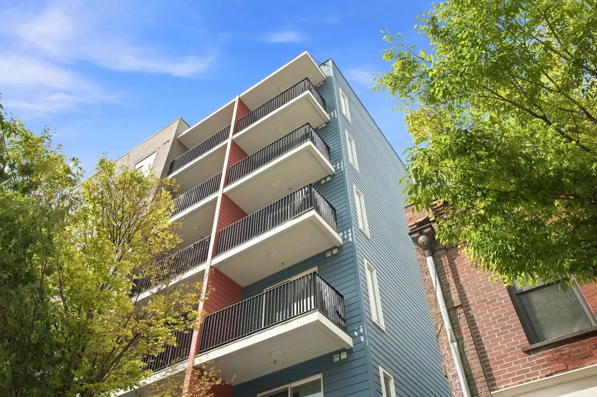 Upward view of stacked balconies on Gateway Apartments