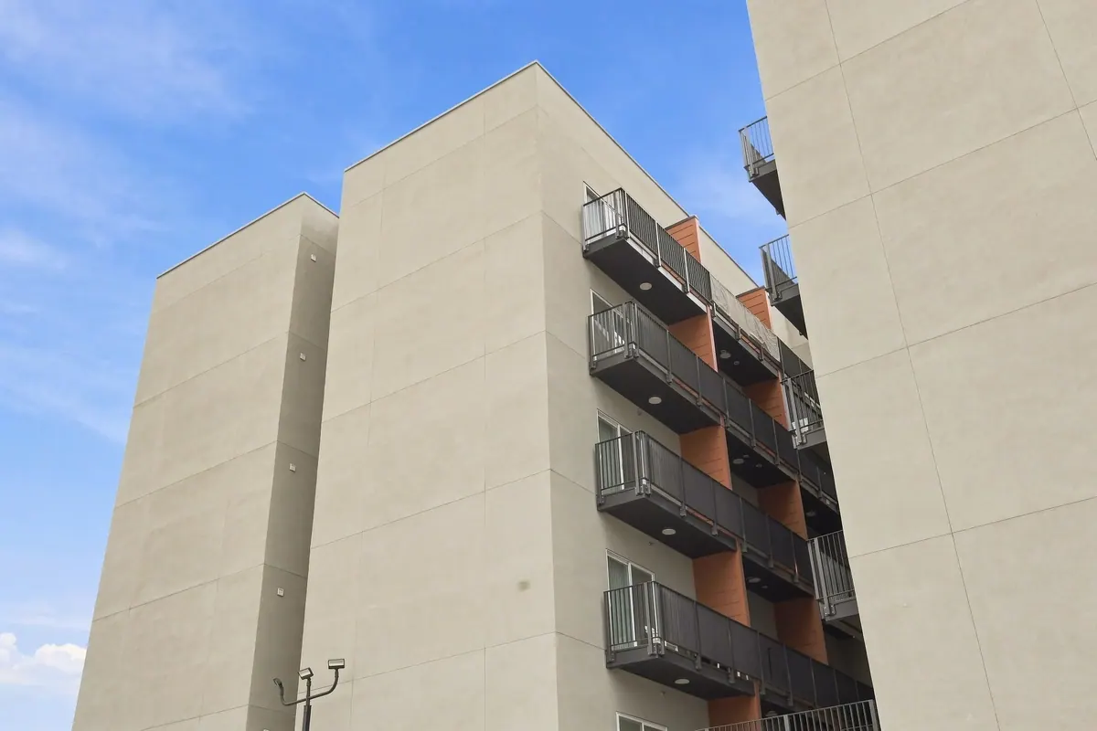 Architectural view of balconies and corner facade at Fair Park Apartments