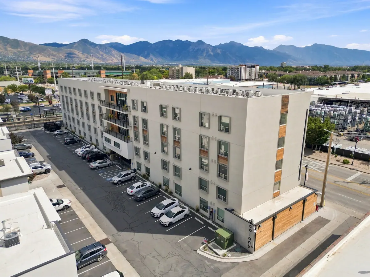 Aerial view of Colony B Apartments and adjacent parking area